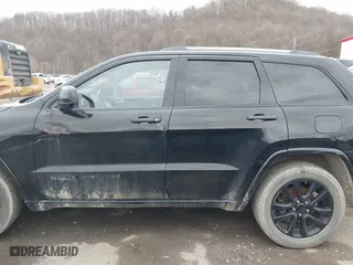 2018 Jeep Grand Cherokee Laredo E with VIN 1C4RJFAG3JC324434, listed as a IAAI auction lot 41812311 with 140,820 mi miles. Bid and sale history available at carsss.com. Image 14.