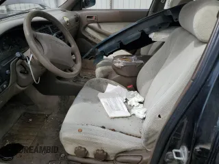 1994 Toyota Camry LE z VIN JT2GK12E2R0039606, wystawiony jako Copart lot #49840015 z przebiegiem 197 834 mil mil oraz Szkoda całkowita • Salvage title. Historia ofert i sprzedaży dostępna na DreamBid. Obrazek 7.