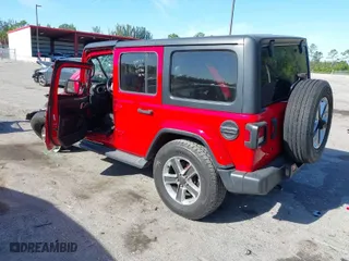 2019 Jeep Wrangler Unlimited Sahara with VIN 1C4HJXEG4KW551806, listed as a IAAI auction lot 41848718 with 97,690 mi miles. Bid and sale history available at carsss.com. Image 3.