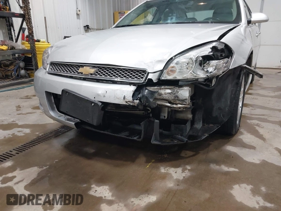 2014 Chevrolet Impala LT with VIN 2G1WB5E37E1178089, listed as a IAAI auction lot 42450127 with 58,277 mi miles and . Bid and sale history available at DreamBid. Image 6.