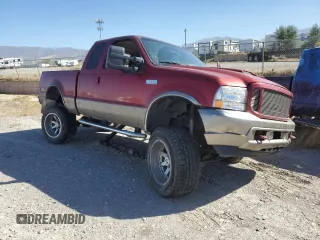 2002 Ford F-350 XL with VIN 1FTSX31F32EC34390, listed as a Copart auction lot 72943644 with Not provided miles and Salvage title. Bid and sale history available at DreamBid. Image 4.