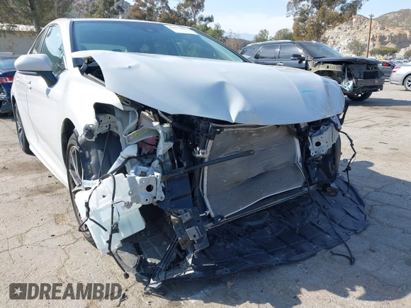 2023 Toyota Camry SE with VIN 4T1T11AK8PU138805, listed as a IAAI auction lot 41977827 with 19,661 mi miles and . Bid and sale history available at DreamBid. Image 6.