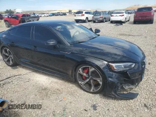2019 Audi RS 5 Sportback z VIN WUABWCF55KA901621, wystawiony jako Copart lot #67157414 z przebiegiem 99 954 mil mil oraz Szkody całkowita. Historia ofert i sprzedaży dostępna na DreamBid. Obrazek 4.