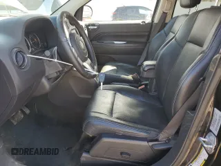 2016 Jeep Compass High Altitude Edition with VIN 1C4NJDEB0GD772702, listed as a Copart auction lot 52634105 with 74,494 mi miles and Salvage Title. Bid and sale history available at carsss.com. Image 7.