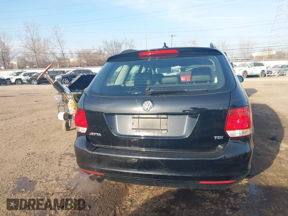 2012 Volkswagen Jetta SportWagen TDI with VIN 3VWPL7AJ8CM702152, listed as a IAAI auction lot 41770833 with 129,621 mi miles. Bid and sale history available at carsss.com. Image 16.