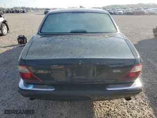 2003 Jaguar XJ with VIN SAJDA12C63LF56705, listed as a Copart auction lot 81903784 with 0 mi miles and Salvage Title. Bid and sale history available at carsss.com. Image 6.