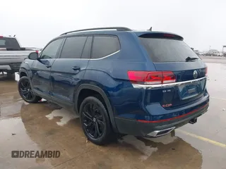 2023 Volkswagen Atlas SE z VIN 1V2WR2CA3PC507742, wystawiony jako IAAI lot #41282782 z przebiegiem 26 052 mil mil oraz . Historia ofert i sprzedaży dostępna na DreamBid. Obrazek 3.