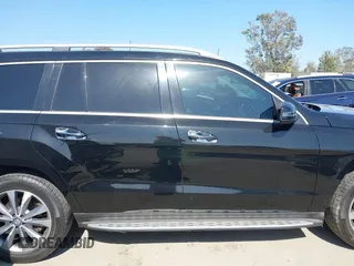 2014 Mercedes-Benz GL 450 with VIN 4JGDF7CE7EA414390, listed as a IAAI auction lot 42554915 with 114,997 mi miles and . Bid and sale history available at DreamBid. Image 13.