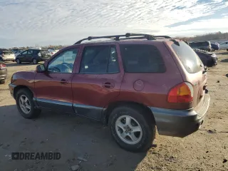 2001 Hyundai Santa Fe GLS with VIN KM8SC83D01U017352, listed as a Copart auction lot 82592024 with 253,442 mi miles and Salvage Title. Bid and sale history available at carsss.com. Image 2.