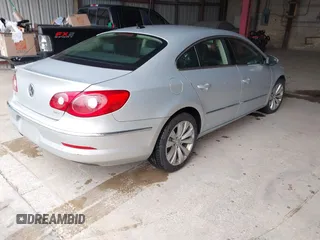 2011 Volkswagen CC Sport with VIN WVWMP7AN3BE733004, listed as a IAAI auction lot 42188172 with 169,293 mi miles. Bid and sale history available at carsss.com. Image 4.