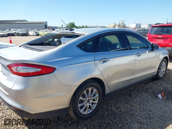 2016 Ford Fusion S z VIN 3FA6P0G76GR377005, wystawiony jako IAAI lot #42006585 z przebiegiem 100 575 mil mil oraz . Historia ofert i sprzedaży dostępna na DreamBid. Obrazek 4.