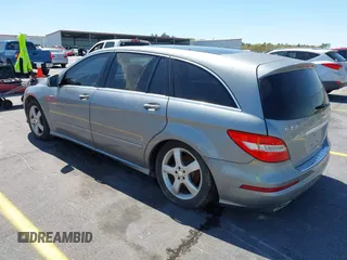 2011 Mercedes-Benz R 350 with VIN 4JGCB6FE0BA114232, listed as a IAAI auction lot 41876271 with 105,954 mi miles and . Bid and sale history available at DreamBid. Image 3.