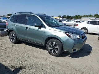 2018 Subaru Forester Premium with VIN JF2SJAGC9JH507009, listed as a Copart auction lot 54941095 with 208,347 mi miles and Salvage Title. Bid and sale history available at DreamBid. Image 4.