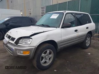 1998 Toyota RAV4 with VIN JT3GP10V9W7031439, listed as a IAAI auction lot 41489043 with 127,726 mi miles and . Bid and sale history available at DreamBid. Image 2.
