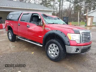 2012 Ford F-150 XL with VIN 1FTFW1ET1CFA18994, listed as a IAAI auction lot 41911367 with 212,883 mi miles. Bid and sale history available at carsss.com. Image 1.