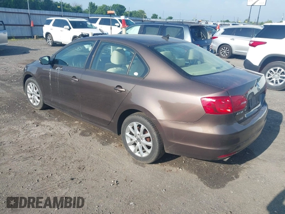 2011 Volkswagen Jetta Sedan SE w/Convenience & Sunroof with VIN 3VWDX7AJXBM329427, listed as a IAAI auction lot 42121116 with 193,490 mi miles. Bid and sale history available at carsss.com. Image 3.