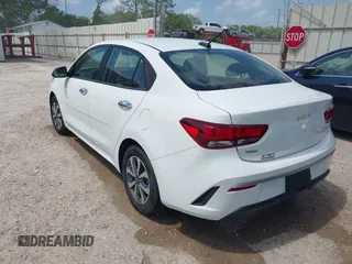 2023 Kia Rio S with VIN 3KPA24AD4PE528715, listed as a IAAI auction lot 41912848 with 11,546 mi miles. Bid and sale history available at carsss.com. Image 3.