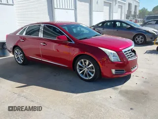2014 Cadillac XTS Luxury z VIN 2G61M5S38E9205711, wystawiony jako IAAI lot #41817545 z przebiegiem 116 633 mil mil oraz . Historia ofert i sprzedaży dostępna na DreamBid. Obrazek 1.