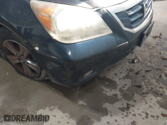 2010 Honda Odyssey Touring with VIN 5FNRL3H98AB095042, listed as a IAAI auction lot 41394894 with 254,525 mi miles. Bid and sale history available at carsss.com. Image 6.