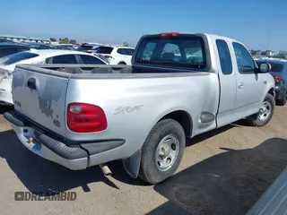 2002 Ford F-150 XL with VIN 1FTRX07242KA59876, listed as a IAAI auction lot 42673613 with 85,536 mi miles and . Bid and sale history available at DreamBid. Image 4.
