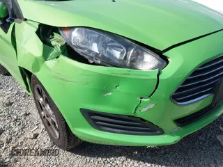 2014 Ford Fiesta SE with VIN 3FADP4BJ8EM226260, listed as a IAAI auction lot 41833140 with 188,917 mi miles and . Bid and sale history available at DreamBid. Image 6.