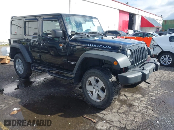 2011 Jeep Wrangler Unlimited Rubicon with VIN 1J4BA6H13BL513311, listed as a IAAI auction lot 41809207 with 124,716 mi miles and . Bid and sale history available at DreamBid. Image 1.