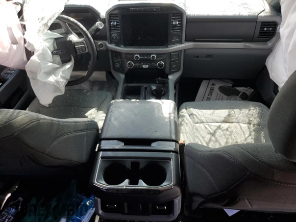 2024 Ford F-150 XLT with VIN 1FTFW3LD4RFB87701, listed as a Copart auction lot 48955865 with 1,203 mi miles and Salvage Title. Bid and sale history available at DreamBid. Image 8.