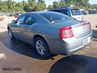 2006 Dodge Charger R/T with VIN 2B3KA53HX6H279600, listed as a IAAI auction lot 40311519 with 273,679 mi miles. Bid and sale history available at carsss.com. Image 3.
