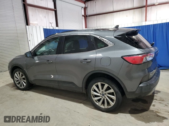 2021 Ford Escape Titanium with VIN 1FMCU9J94MUA78942, listed as a Copart auction lot 88119075 with 55,153 mi miles and Salvage Title. Bid and sale history available at carsss.com. Image 2.