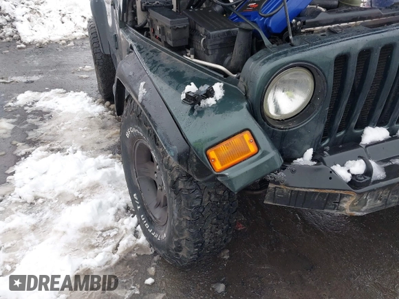 2003 Jeep Wrangler X with VIN 1J4FA39S13P310046, listed as a IAAI auction lot 41555652 with 177,503 mi miles and . Bid and sale history available at DreamBid. Image 6.