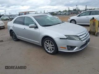 2011 Ford Fusion SEL with VIN 3FAHP0JG3BR330704, listed as a IAAI auction lot 42116994 with 215,020 mi miles. Bid and sale history available at carsss.com. Image 1.