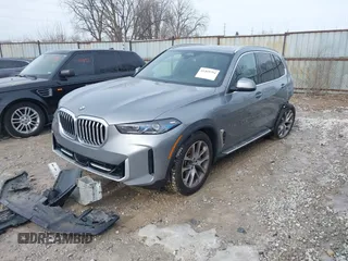 2025 BMW X5 xDrive40i with VIN 5UX23EU02S9X44610, listed as a IAAI auction lot 41469794 with 1,964 mi miles. Bid and sale history available at carsss.com. Image 19.