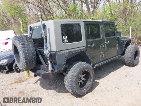 2007 Jeep Wrangler Unlimited X with VIN 1J4GA39147L101084, listed as a IAAI auction lot 41988628 with 194,562 mi miles and . Bid and sale history available at DreamBid. Image 4.