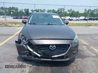 2017 Mazda 3 Touring with VIN 3MZBN1V74HM142735, listed as a IAAI auction lot 42395462 with 137,543 mi miles and . Bid and sale history available at DreamBid. Image 12.