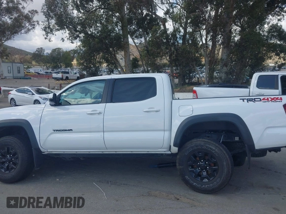 2019 Toyota Tacoma SR z VIN 3TMCZ5AN5KM249582, wystawiony jako IAAI lot #41925752 z przebiegiem 108 417 mil mil oraz . Historia ofert i sprzedaży dostępna na DreamBid. Obrazek 15.