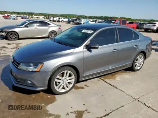 2017 Volkswagen Jetta SEL z VIN 3VWL17AJ2HM401873, wystawiony jako Copart lot #52229115 z przebiegiem 130 093 mil mil oraz Czysty tytuł • Clean title. Historia ofert i sprzedaży dostępna na DreamBid. Obrazek 1.