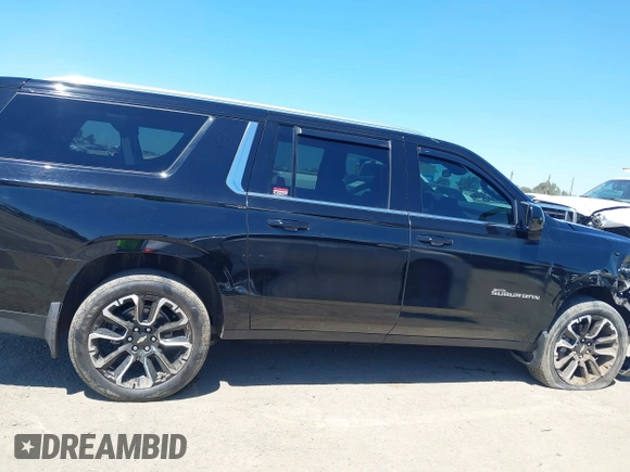 2023 Chevrolet Suburban LS z VIN 1GNSCBKD3PR457569, wystawiony jako IAAI lot #42225571 z przebiegiem 53 410 mil mil oraz . Historia ofert i sprzedaży dostępna na DreamBid. Obrazek 14.
