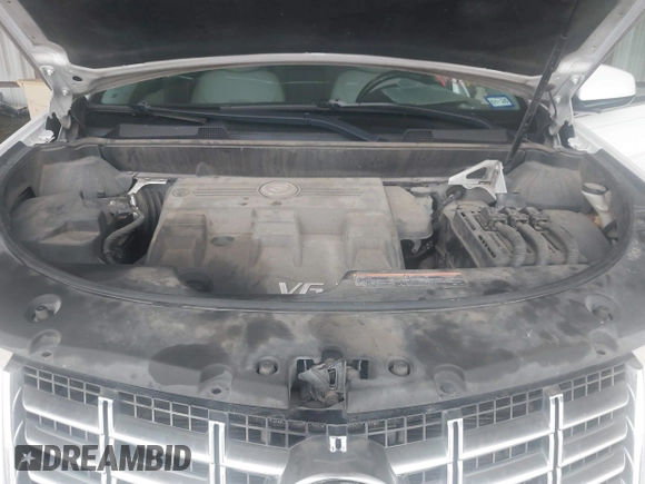 2014 Cadillac SRX z VIN 3GYFNAE32ES580480, wystawiony jako IAAI lot #42170765 z przebiegiem 148 245 mil mil oraz . Historia ofert i sprzedaży dostępna na DreamBid. Obrazek 10.