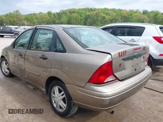 2003 Ford Focus SE with VIN 1FAFP34PX3W123696, listed as a IAAI auction lot 42065510 with 159,842 mi miles and . Bid and sale history available at carsss.com. Image 3.