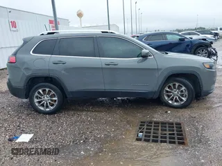 2021 Jeep Cherokee Latitude Lux with VIN 1C4PJLMXXMD203934, listed as a IAAI auction lot 41548713 with 64,746 mi miles. Bid and sale history available at carsss.com. Image 14.