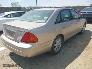 2002 Toyota Avalon XL with VIN 4T1BF28BX2U266853, listed as a IAAI auction lot 42091935 with 176,192 mi miles. Bid and sale history available at carsss.com. Image 4.