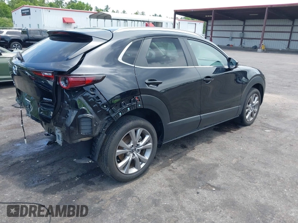 2023 Mazda CX-30 S Carbon Edition с VIN 3MVDMBCM7PM549197, выставлен на аукционе IAAI как лот 42224977 с пробегом 22 201 миль миль и . История ставок и продаж доступна на DreamBid. Изображение 4.