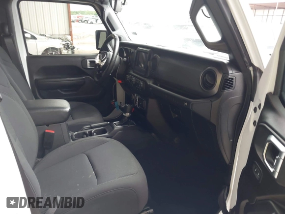 2023 Jeep Wrangler Sport S with VIN 1C4HJXDG8PW620005, listed as a IAAI auction lot 42117455 with 25,725 mi miles and . Bid and sale history available at DreamBid. Image 5.