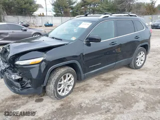 2015 Jeep Cherokee Latitude with VIN 1C4PJMCS5FW773679, listed as a IAAI auction lot 41600768 with 166,754 mi miles. Bid and sale history available at carsss.com. Image 17.