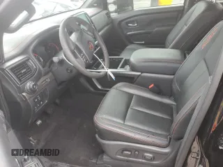 2024 Nissan Titan Pro-4X with VIN 1N6AA1ED7RN106896, listed as a Copart auction lot 55622215 with 16,155 mi miles and Salvage title. Bid and sale history available at DreamBid. Image 7.