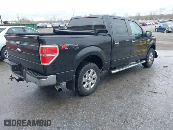 2013 Ford F-150 XL with VIN 1FTFW1ETXDFD72322, listed as a IAAI auction lot 41957807 with 312,909 mi miles. Bid and sale history available at carsss.com. Image 4.