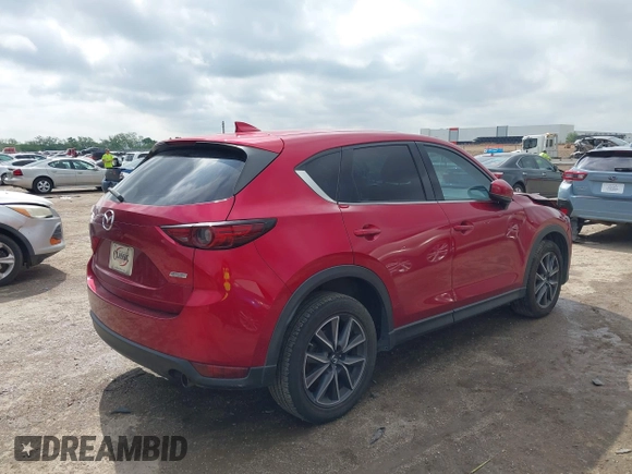 2018 Mazda CX-5 Grand Touring with VIN JM3KFADM7J1357401, listed as a IAAI auction lot 42106012 with 119,420 mi miles and . Bid and sale history available at DreamBid. Image 4.