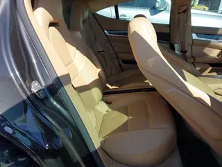 2014 Porsche Panamera S E-Hybrid with VIN WP0AD2A76EL044591, listed as a IAAI auction lot 42436817 with 89,009 mi miles and . Bid and sale history available at DreamBid. Image 8.
