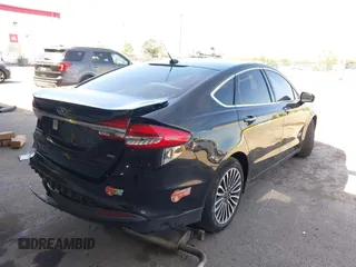 2017 Ford Fusion Energi SE with VIN 3FA6P0PU4HR380184, listed as a IAAI auction lot 42099750 with 126,175 mi miles. Bid and sale history available at carsss.com. Image 4.