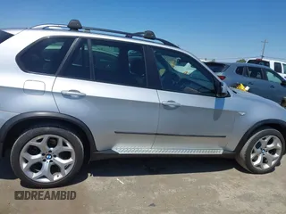 2012 BMW X5 35d with VIN 5UXZW0C58CL671141, listed as a IAAI auction lot 42644381 with 127,464 mi miles and . Bid and sale history available at DreamBid. Image 13.